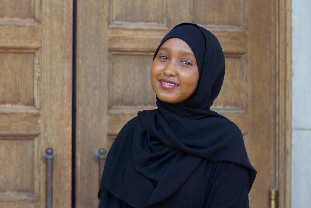 Fatuma Arab's photo for the Association of Black Psychology Students taken in front of Elliot Hall at the University of Minnesota on Saturday, Aug. 19, 2023. Photo by Silke Moeller.