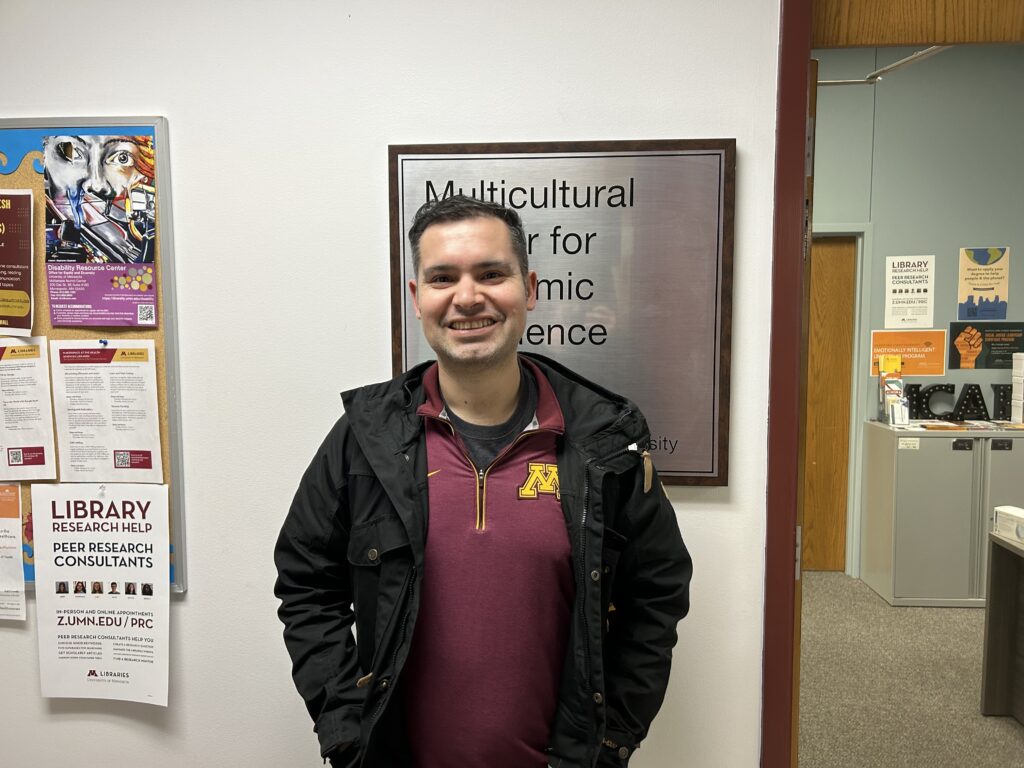 Daniel Morales, the interim director of classroom climate at the Multicultural Center for Academic Excellence, outside his office in Appleby Hall in Minneapolis, Minn., on Monday, April 1, 2024. Morales works with students and staff to create a more inclusive environment for multicultural and first-gen students.