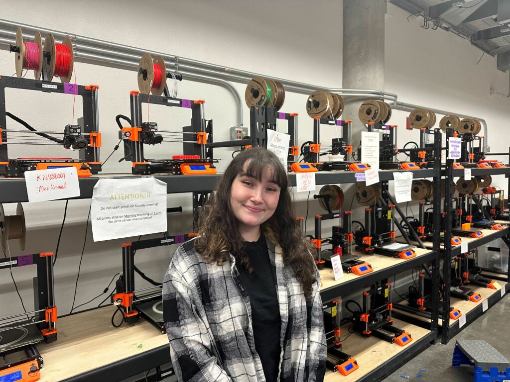 Jimena Jimenez stands in front of the 3D printing machines at Anderson Labs at the University of Minnesota, on Tuesday, Feb. 20, 2024. Photo by Gabriel Castilho.